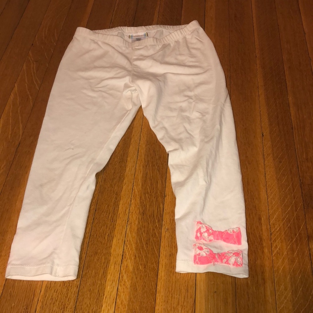 White leggings with bows